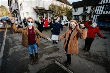 Village volunteers recognised with plaque for lockdown work